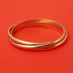 Authenticated pre-owned Trinity Cartier bracelet - 3 Cartier rings