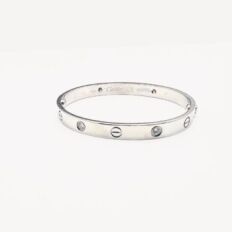 Bracelet Love 4 diamants Cartier d'occasion : Bijou authentifié