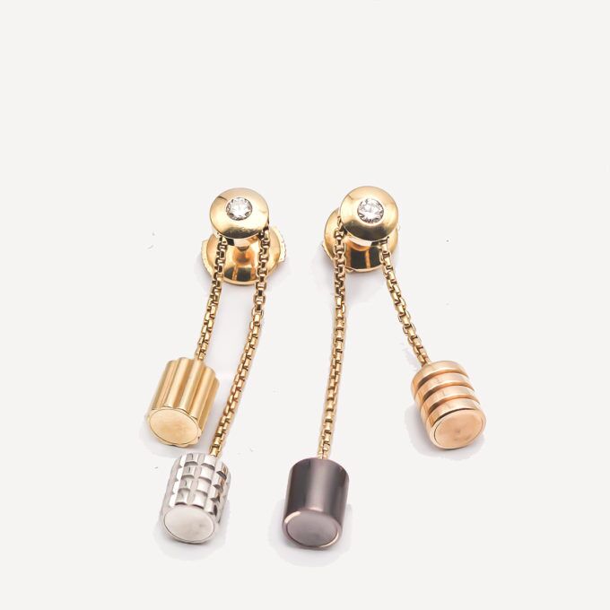 Earrings Quatre collection by Boucheron. Second-hand women's jewellery signed BOUCHERON in 18-carat gold and diamonds.