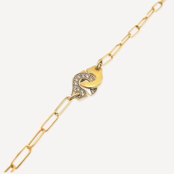 Bracelet Menottes R12 semi pavé Dinh Van d'occasion : Bijou authentifié